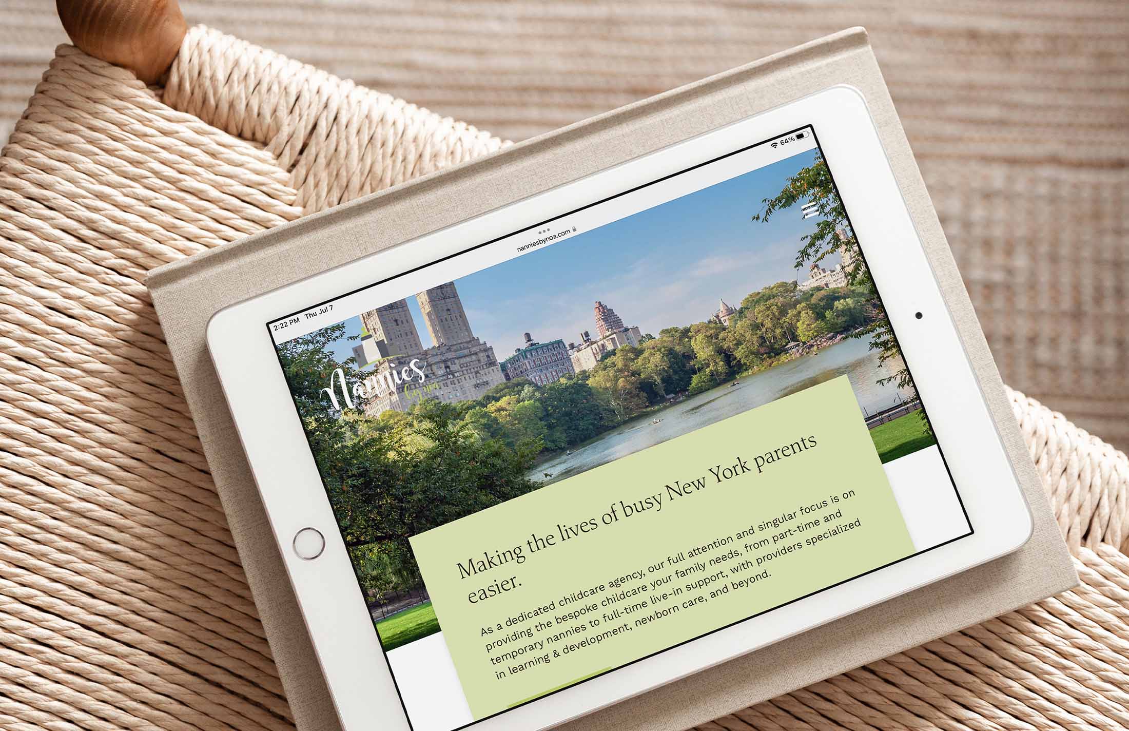 Nannies by Noa website displayed on an iPad, featuring a section about trust and care in matching families with top-tier nannies.