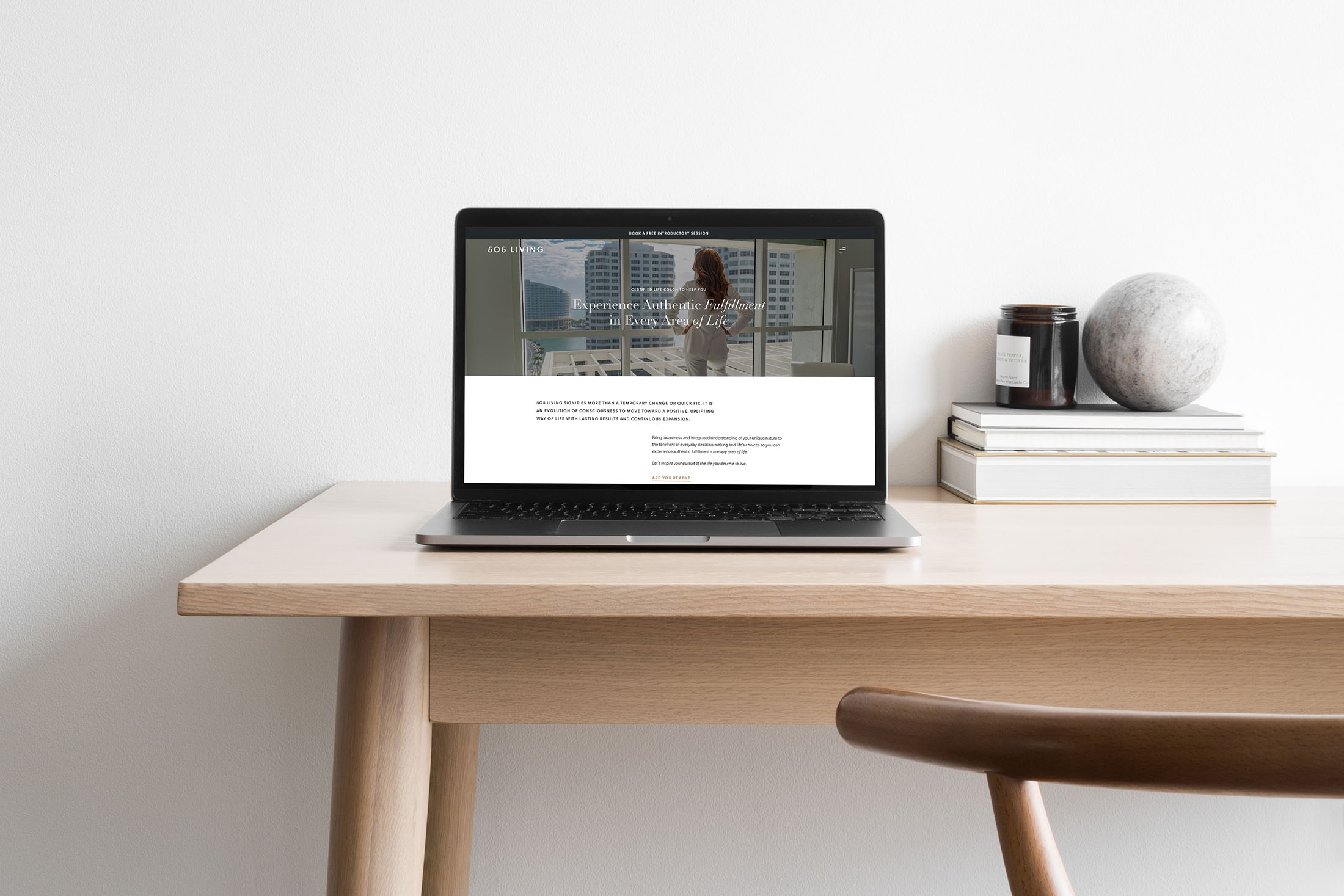 505 Living homepage displayed on a laptop, showcasing a clean, modern design that emphasizes the brand’s premium life coaching services and professional identity.