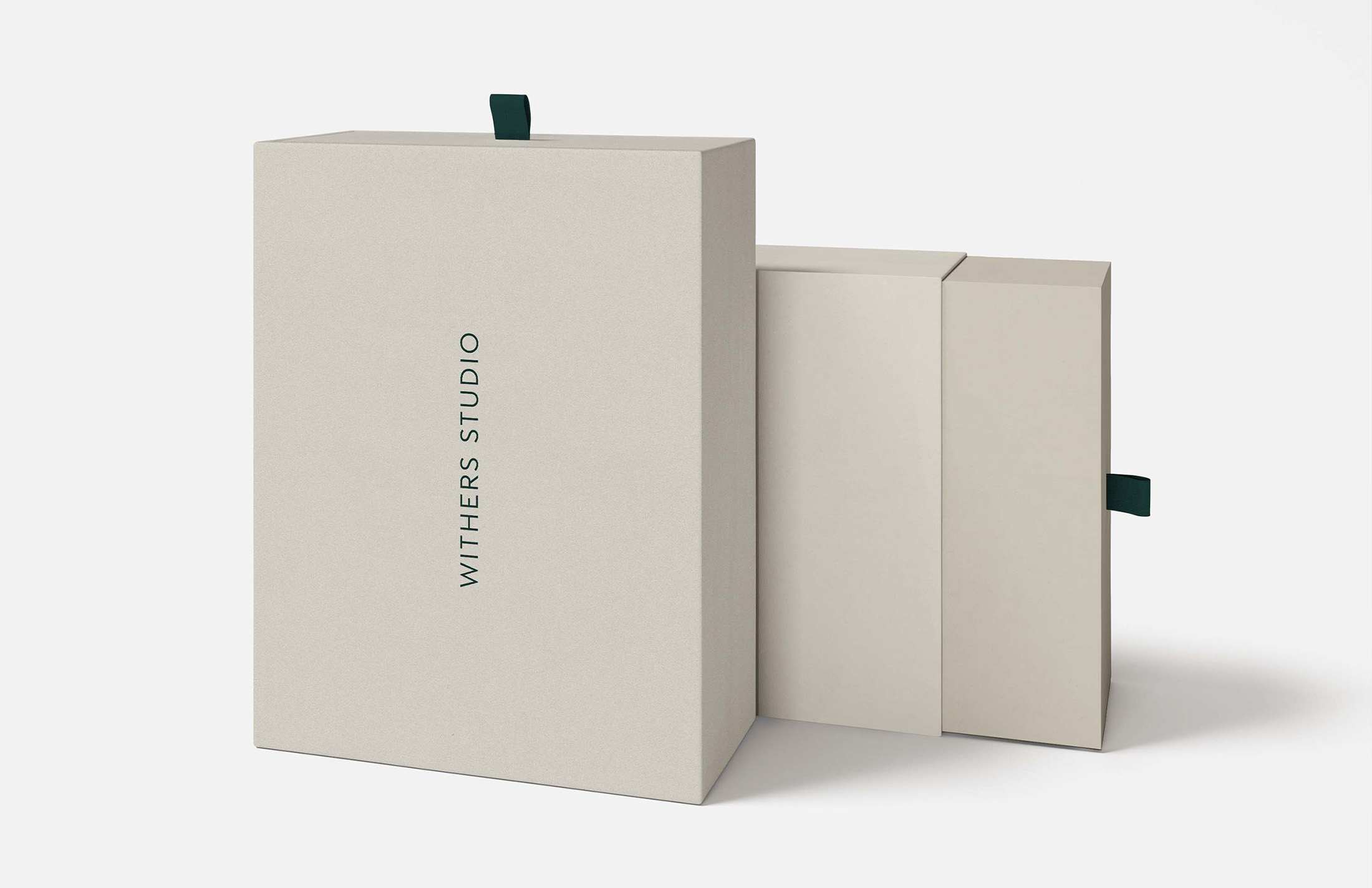 Minimalist packaging design for Withers Studio, featuring their logo in elegant typography and neutral tones, reflecting premium branding and craftsmanship.