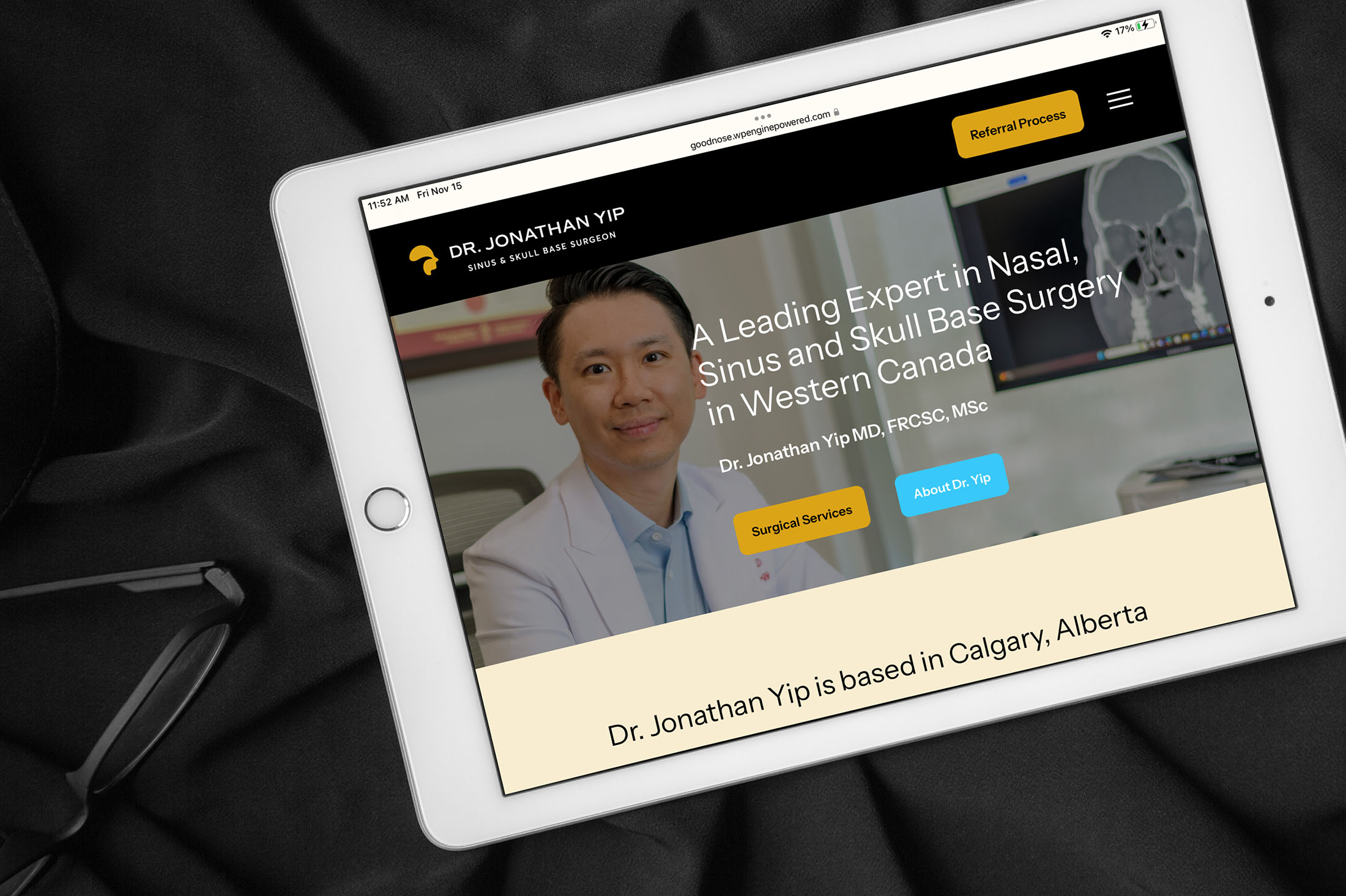 Tablet displaying Dr. Jonathan Yip’s website homepage featuring his expertise in nasal, sinus, and skull base surgery with a modern design and clear call-to-action buttons.