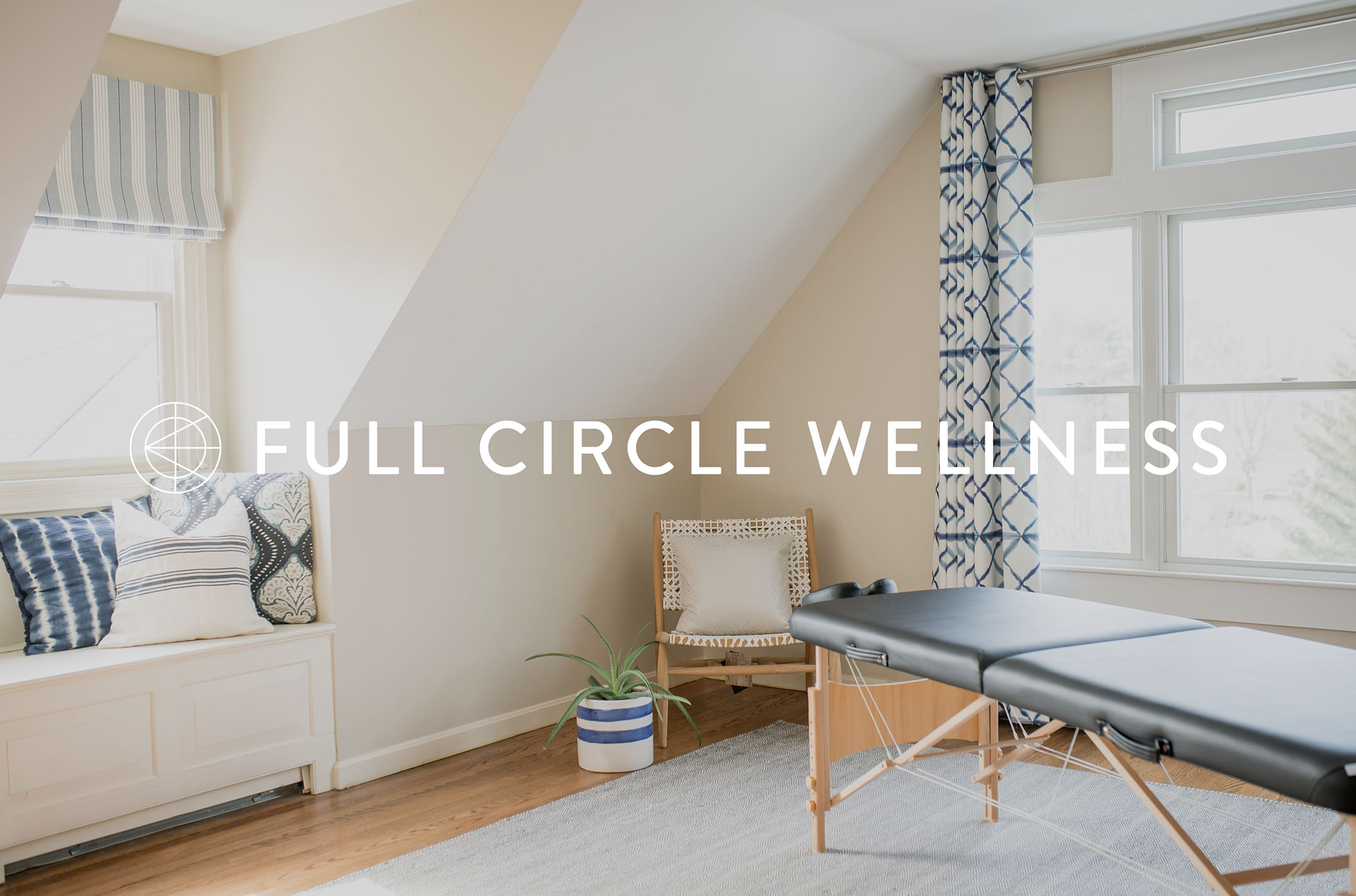 A light-filled treatment room with a massage table, decorative pillows, and plants, overlaid with the “Full Circle Wellness” logo text.