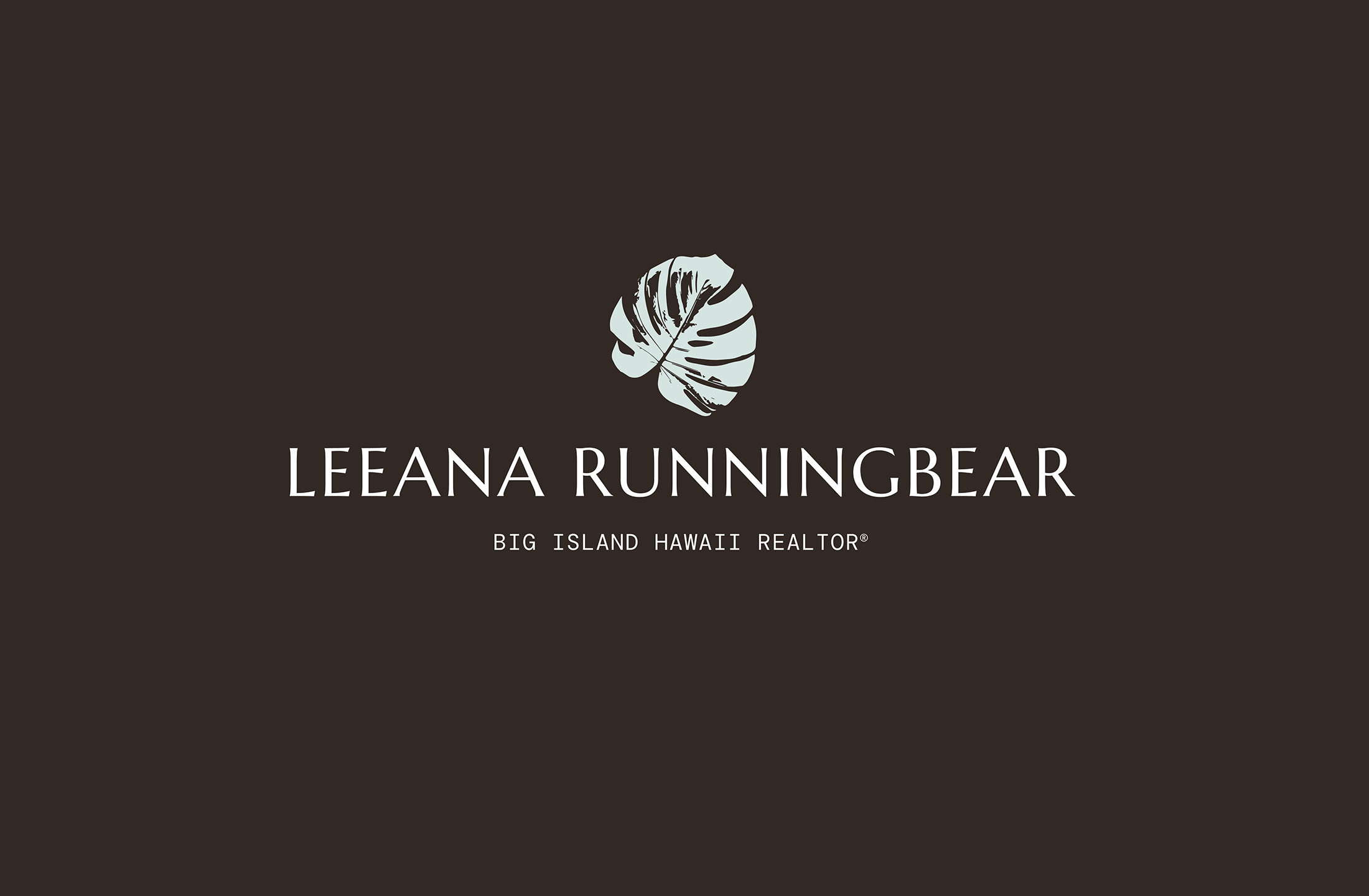 Logo design for Leeana Runningbear Realtor®, showcasing a modern, minimalist font paired with a Monstera leaf graphic, reflecting luxury and the natural beauty of Hawaii’s Big Island