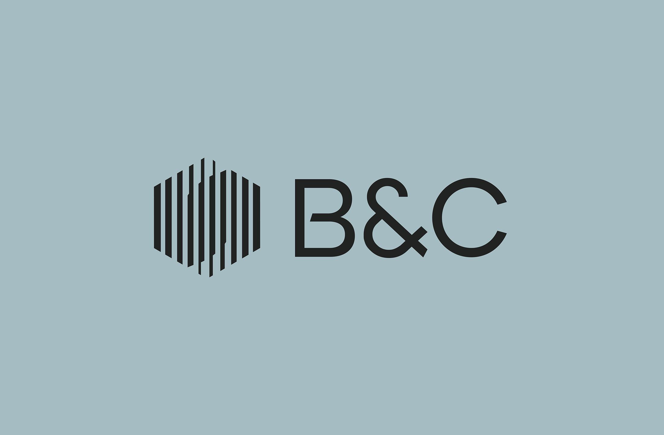 B&C Awnings logo with a geometric hexagonal design and bold typography, representing architectural precision and modern design.