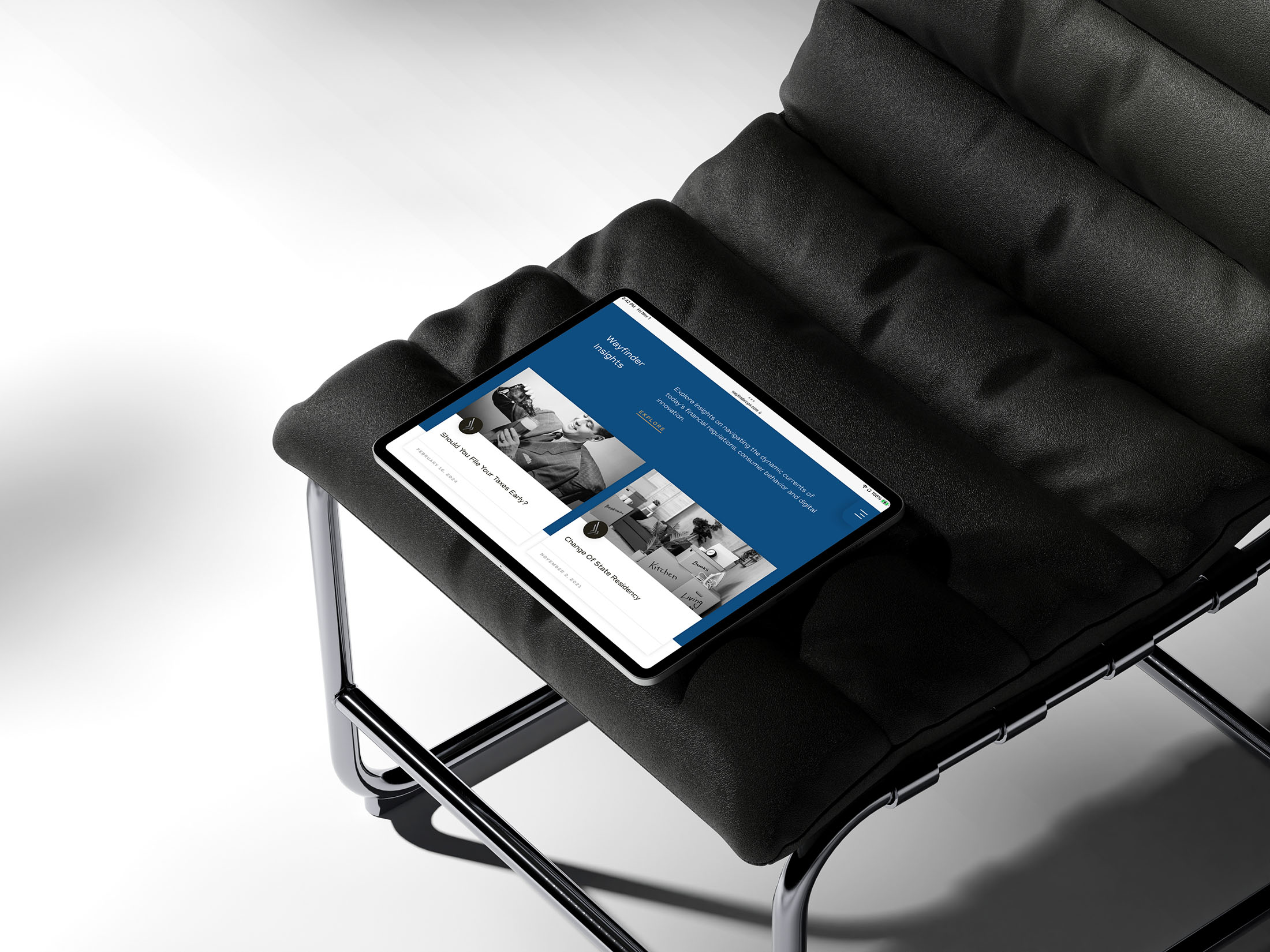 Tablet view of the Wayfinder CPA website on a sleek black chair, highlighting a clean, intuitive interface with client-focused services.