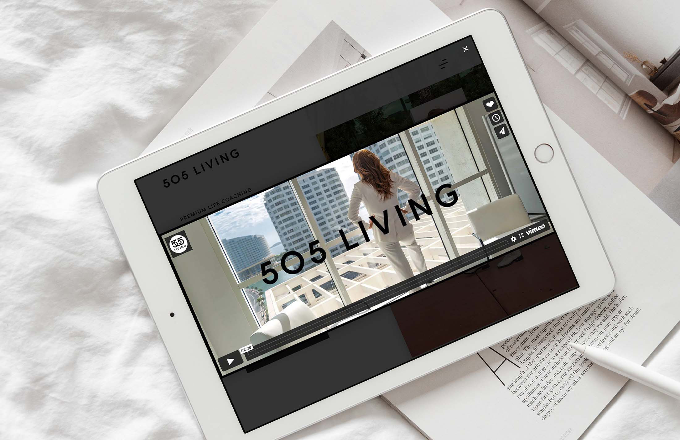 505 Living promotional video displayed on a tablet, showcasing the brand’s premium life coaching services through engaging visuals and modern digital presentation.