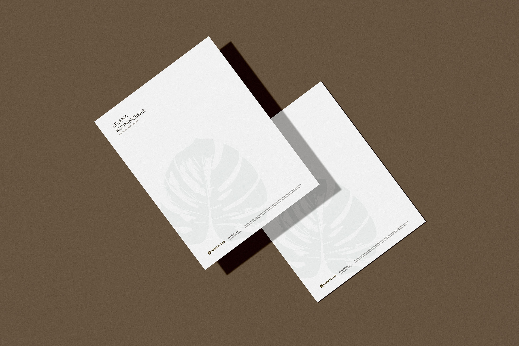 A clean and elegant letterhead design for Leeana Runningbear Realtor® featuring her logo with a subtle monstera leaf design in the background, placed against a warm brown backdrop.