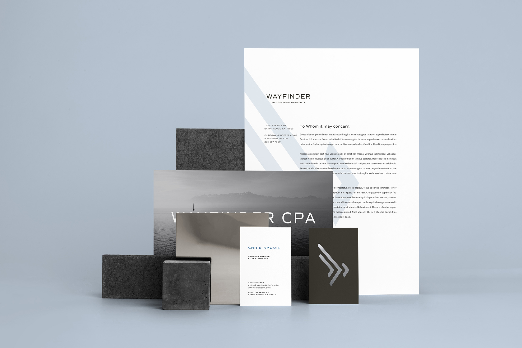 Wayfinder CPA stationery and branding elements, including business cards, letterhead, and a branded folder against a minimal backdrop.