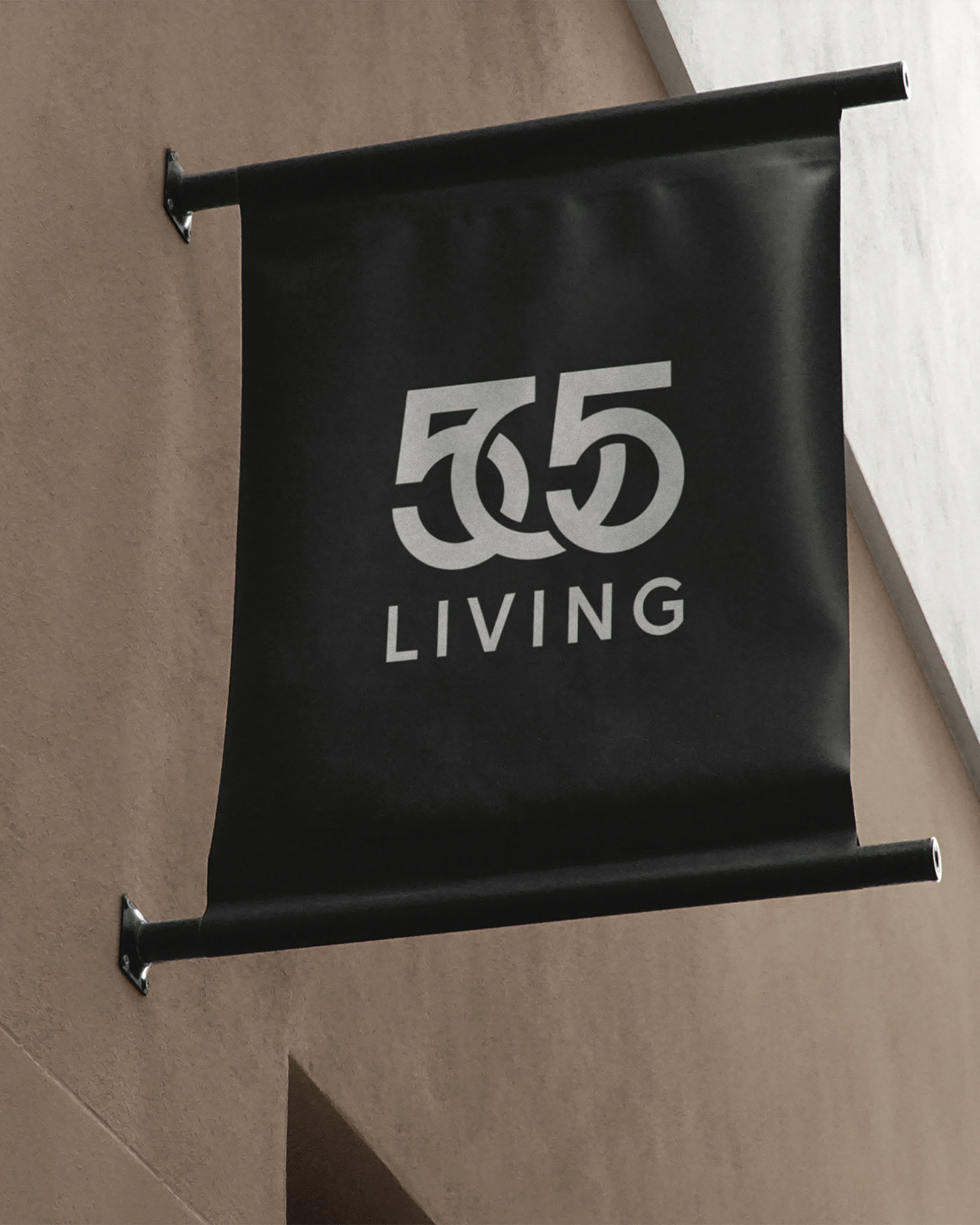 505 Living logo displayed on a sleek black hanging banner, highlighting the brand’s bold and professional identity in a modern urban setting.