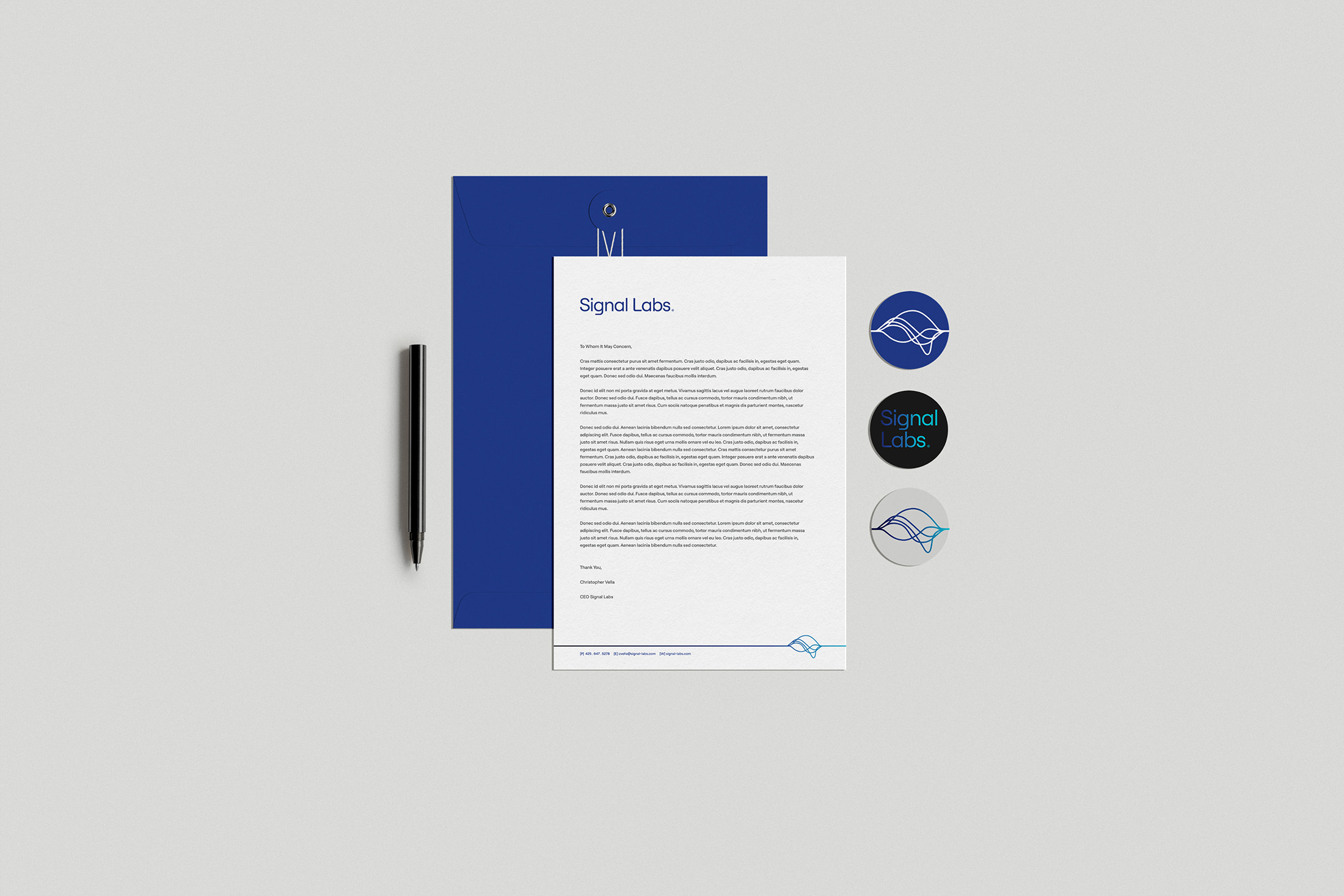 Signal Labs branded stationery set with a blue folder, letterhead, pen, and logo variations displayed on a light gray background.