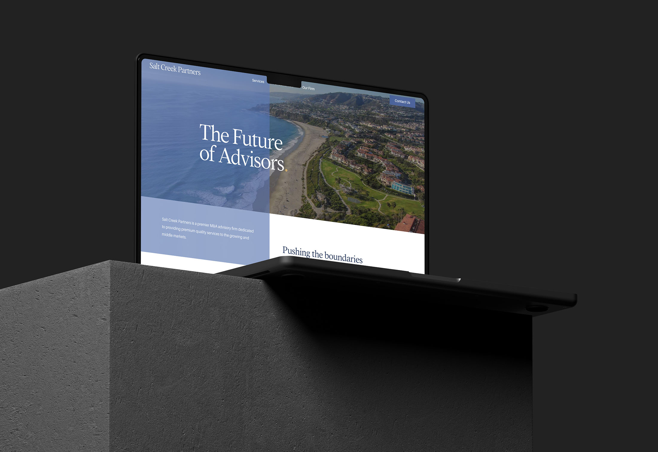 A laptop displaying the Salt Creek Partners website homepage with the tagline “The Future of Advisors” and an image of a coastal landscape.