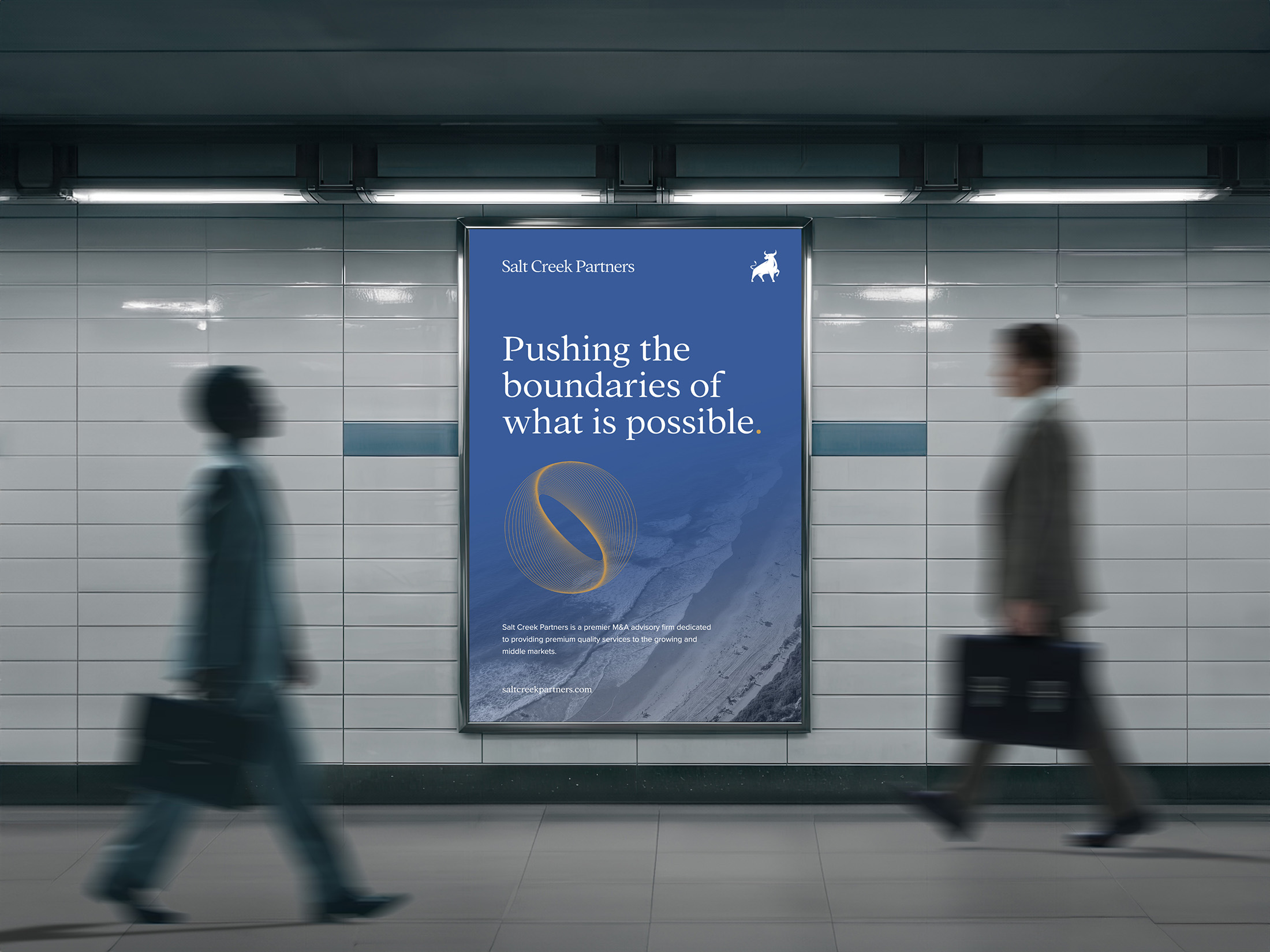 Salt Creek Partners poster displayed in a modern subway station with the tagline “Pushing the boundaries of what is possible” and branding elements.