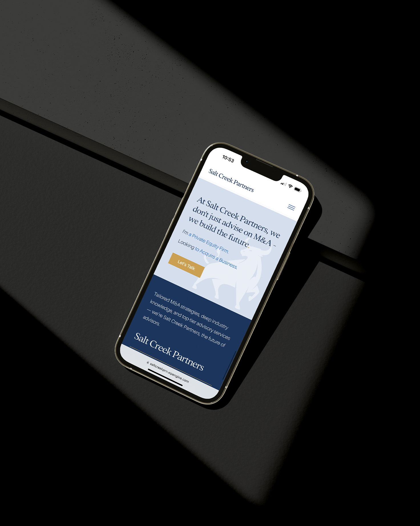 Salt Creek Partners mobile website design displayed on a smartphone, highlighting their tagline and navigation features with a clean, professional interface.