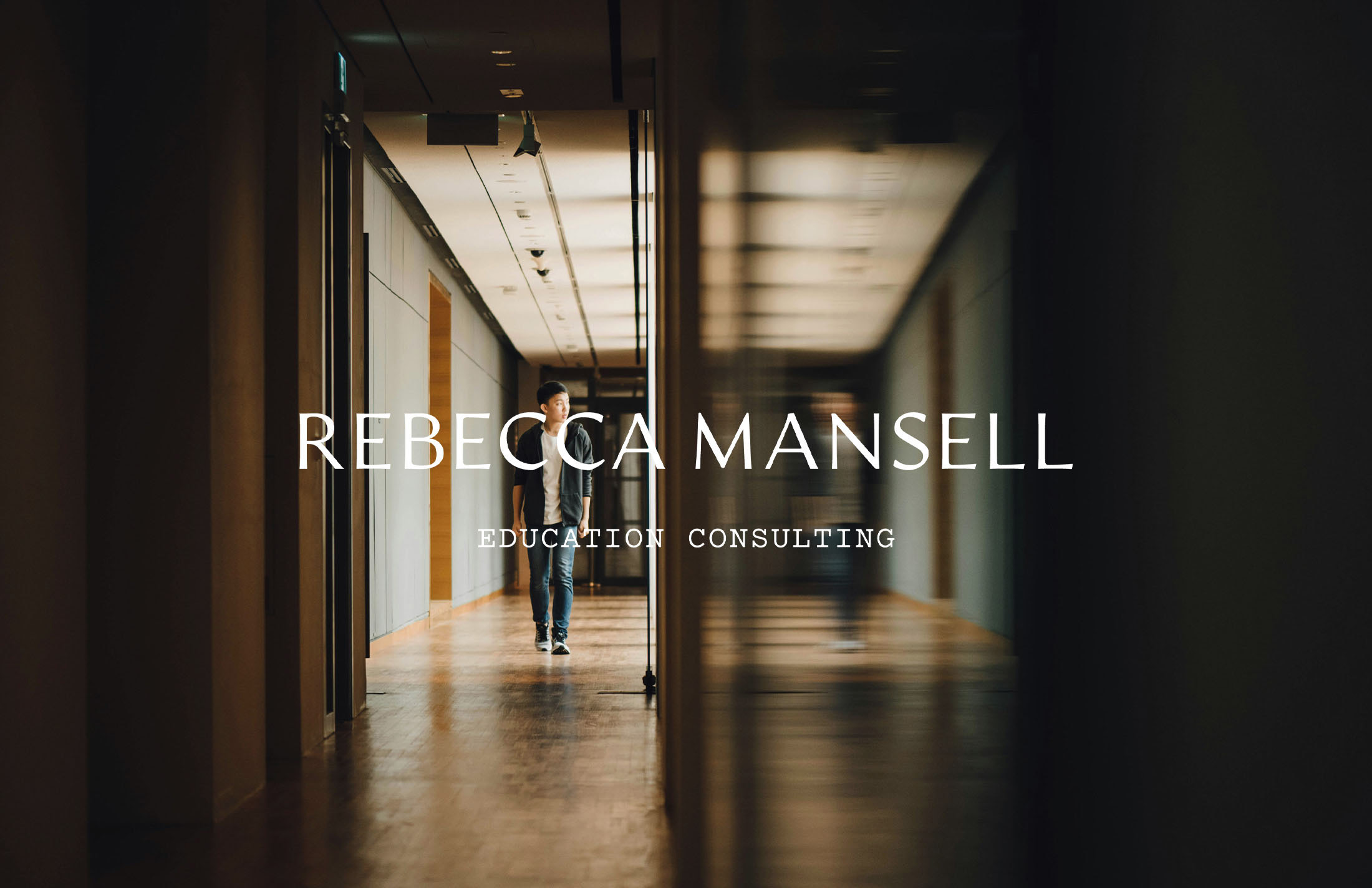 Rebecca Mansell logo displayed prominently over a blurred hallway with a student walking in the background, symbolizing guidance and focus on education consulting.