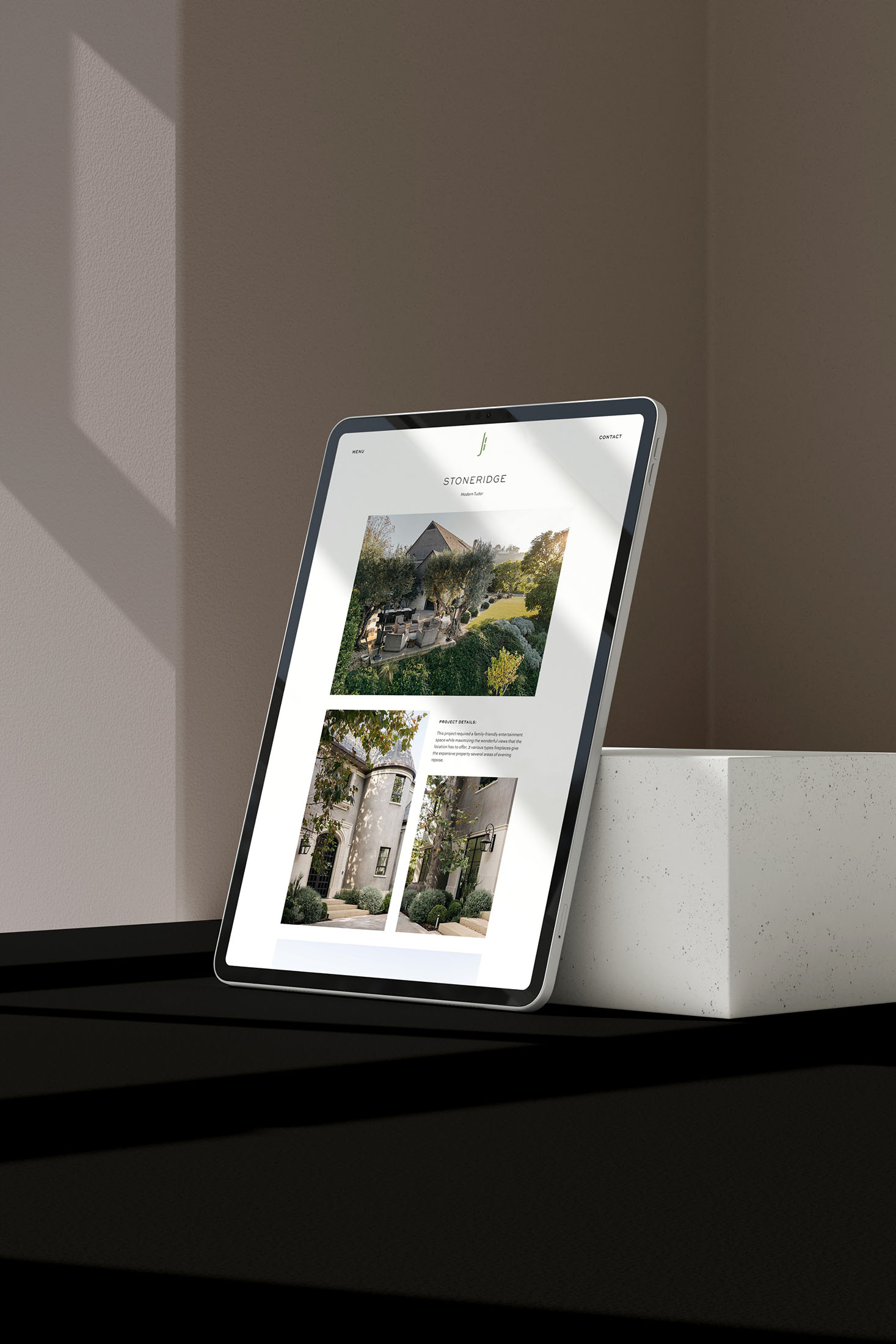 An iPad showcasing the ‘Stoneridge’ project portfolio page, highlighting images and project details of a Mediterranean-inspired landscape design.