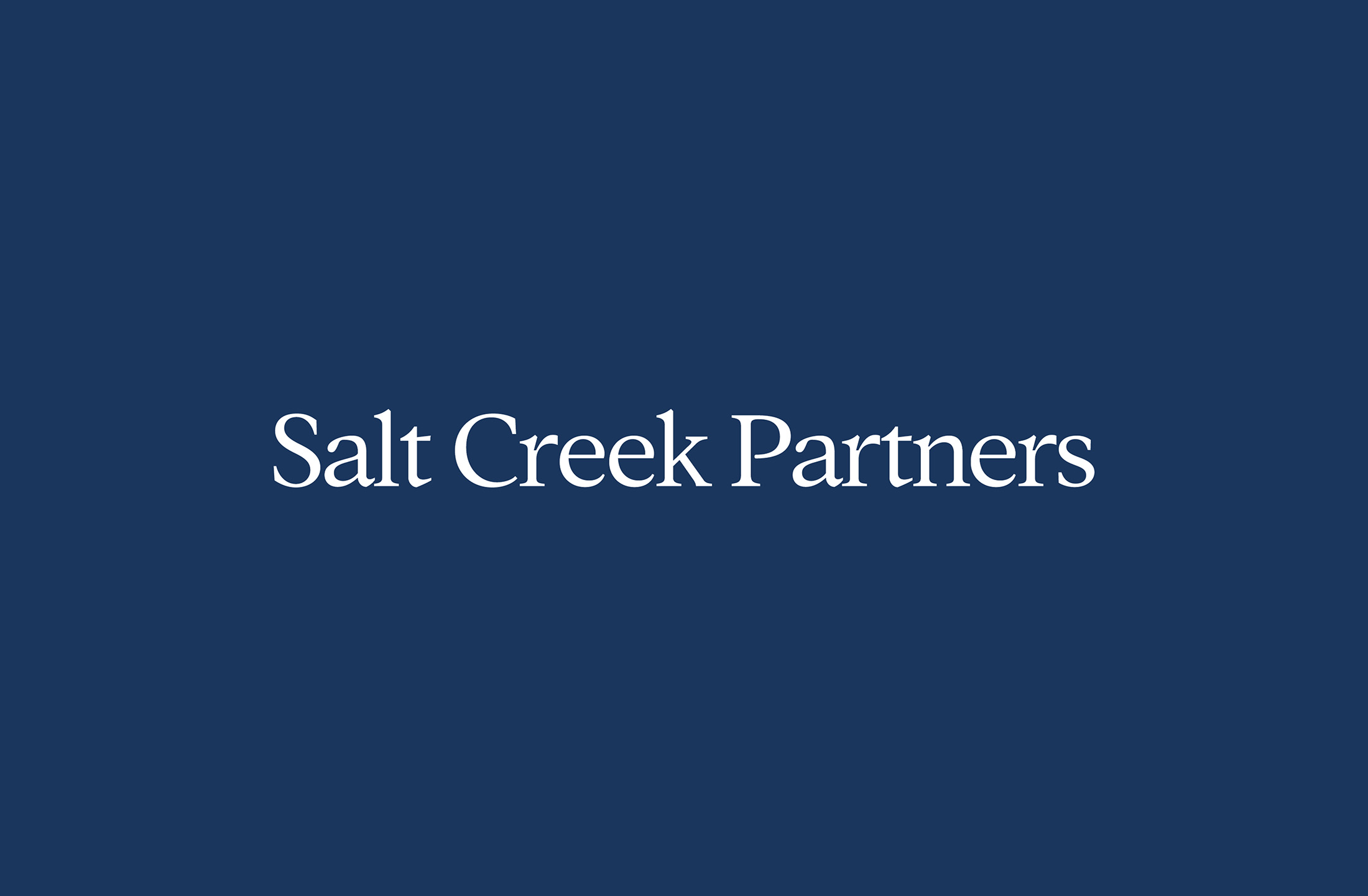 Blue background with “Salt Creek Partners” text in elegant serif font, showcasing the company’s branding.