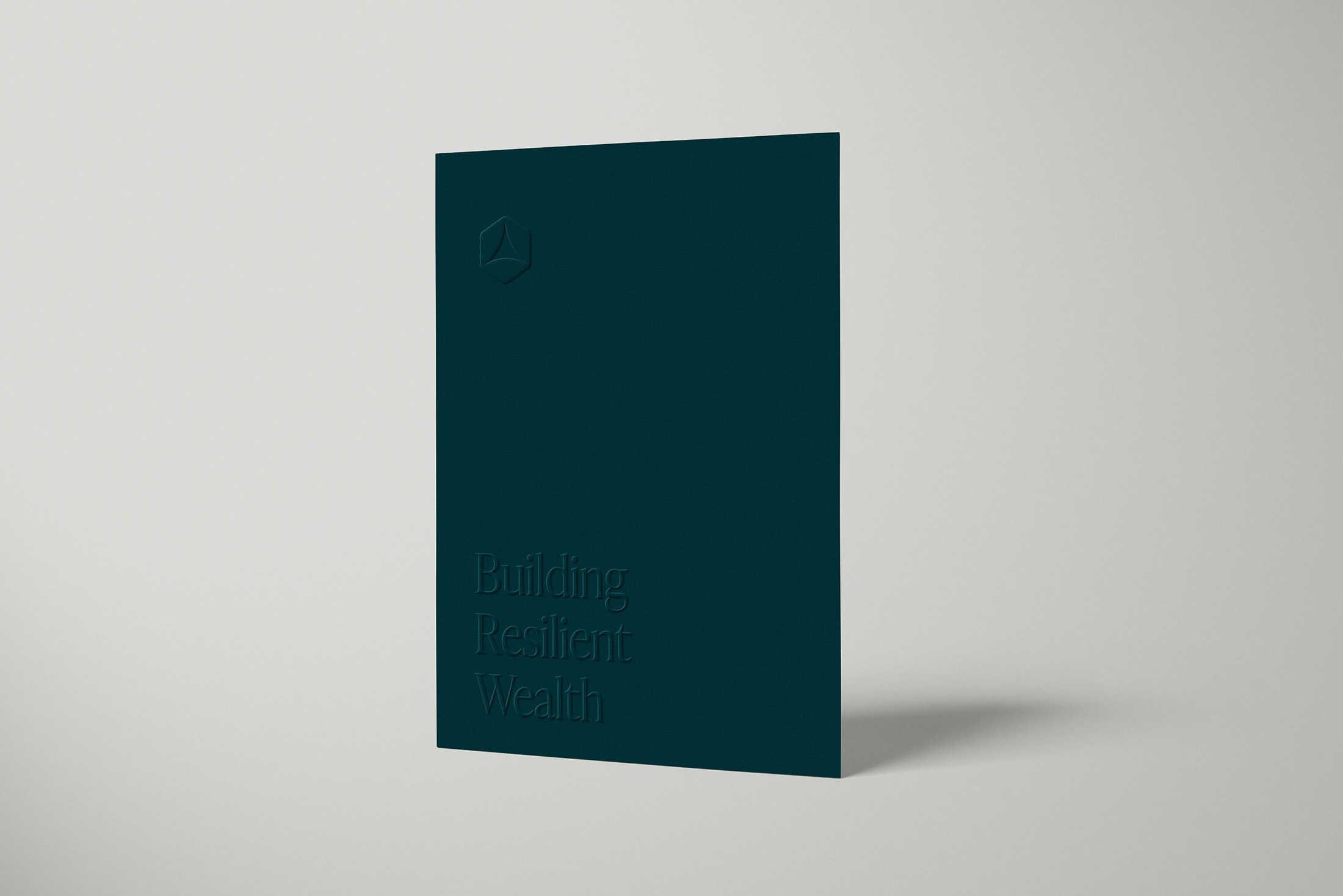 Dark green folder with the Stoic Private Wealth logo and the phrase “Building Resilient Wealth” embossed on the cover.