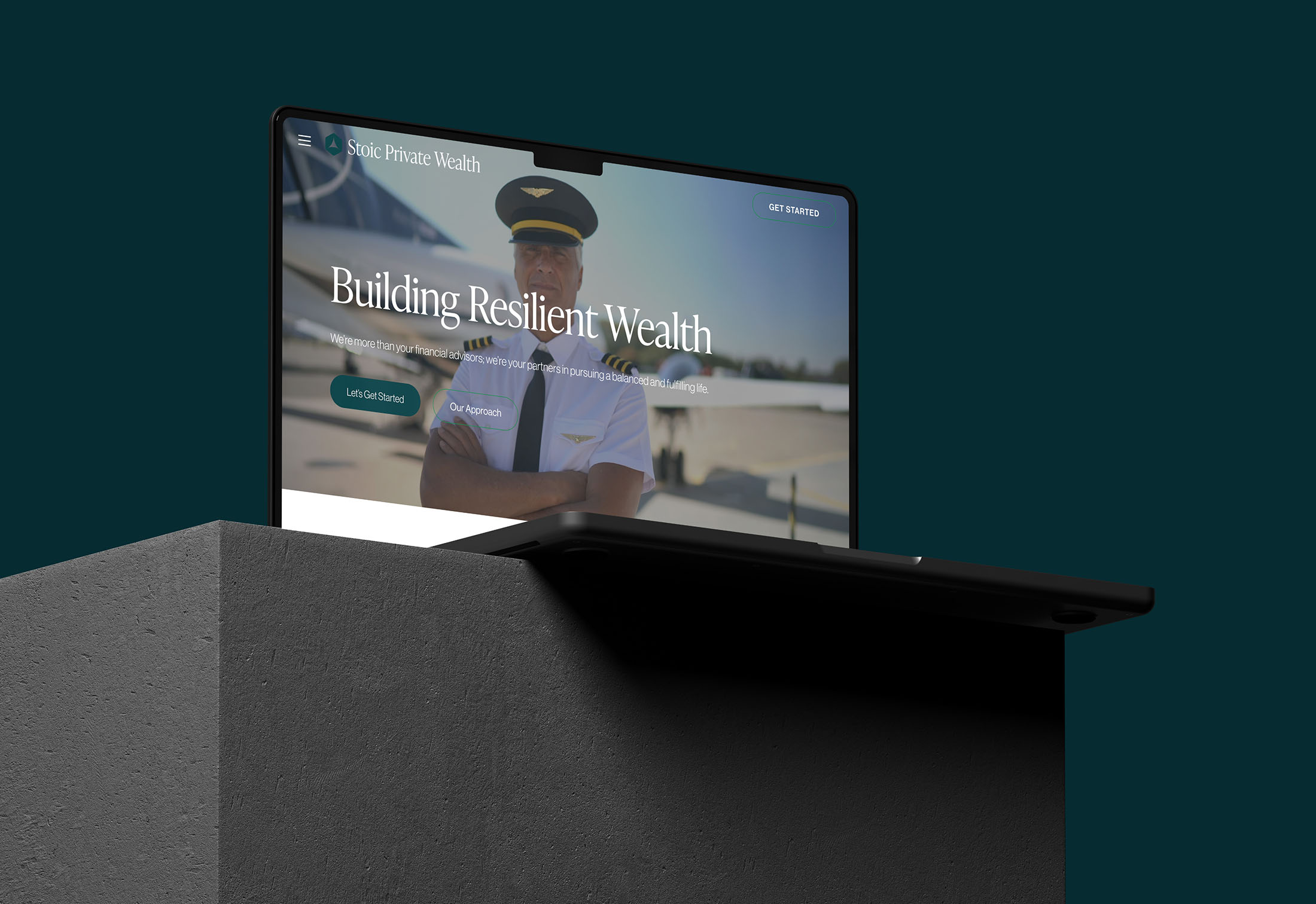 Laptop displaying the Stoic Private Wealth website homepage with the headline “Building Resilient Wealth” and an image of a pilot standing near an airplane.