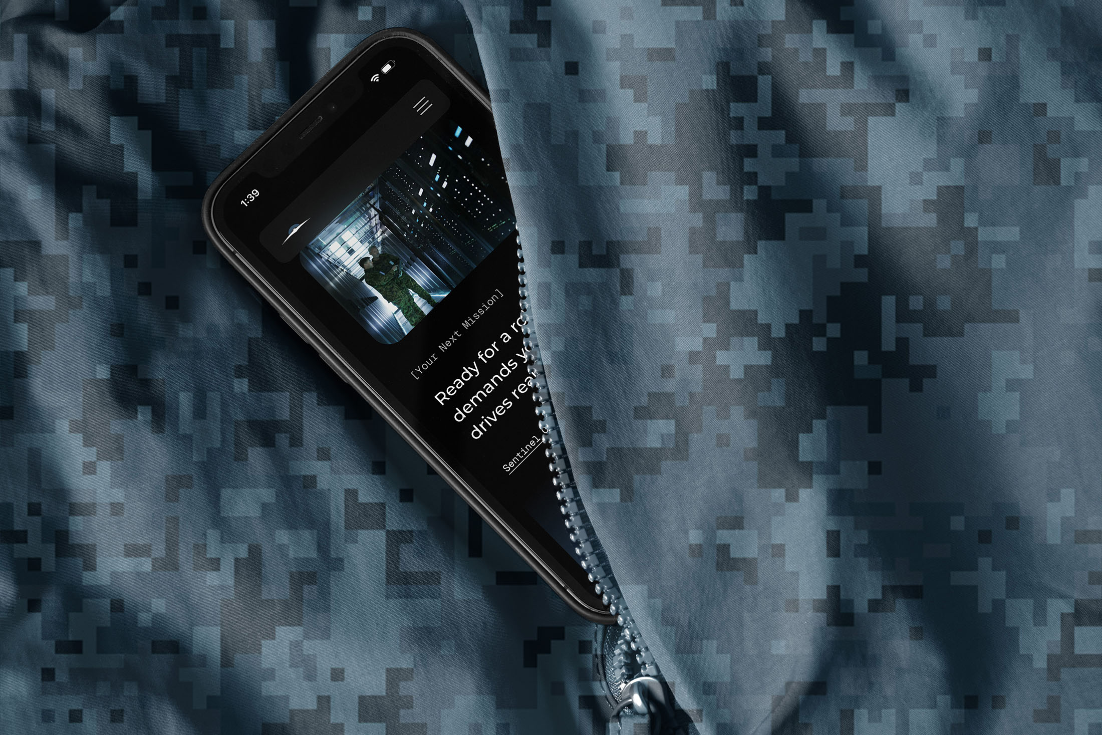 Sentinel Horizon mobile website displayed on a smartphone emerging from digital camouflage fabric
