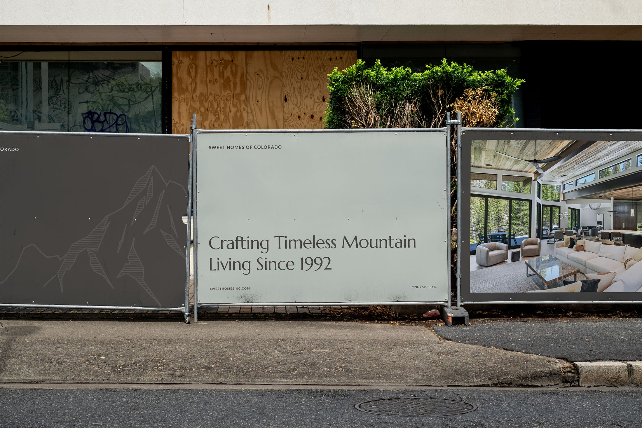 Sweet Homes of Colorado construction site fence signage showcasing custom home interiors and brand messaging